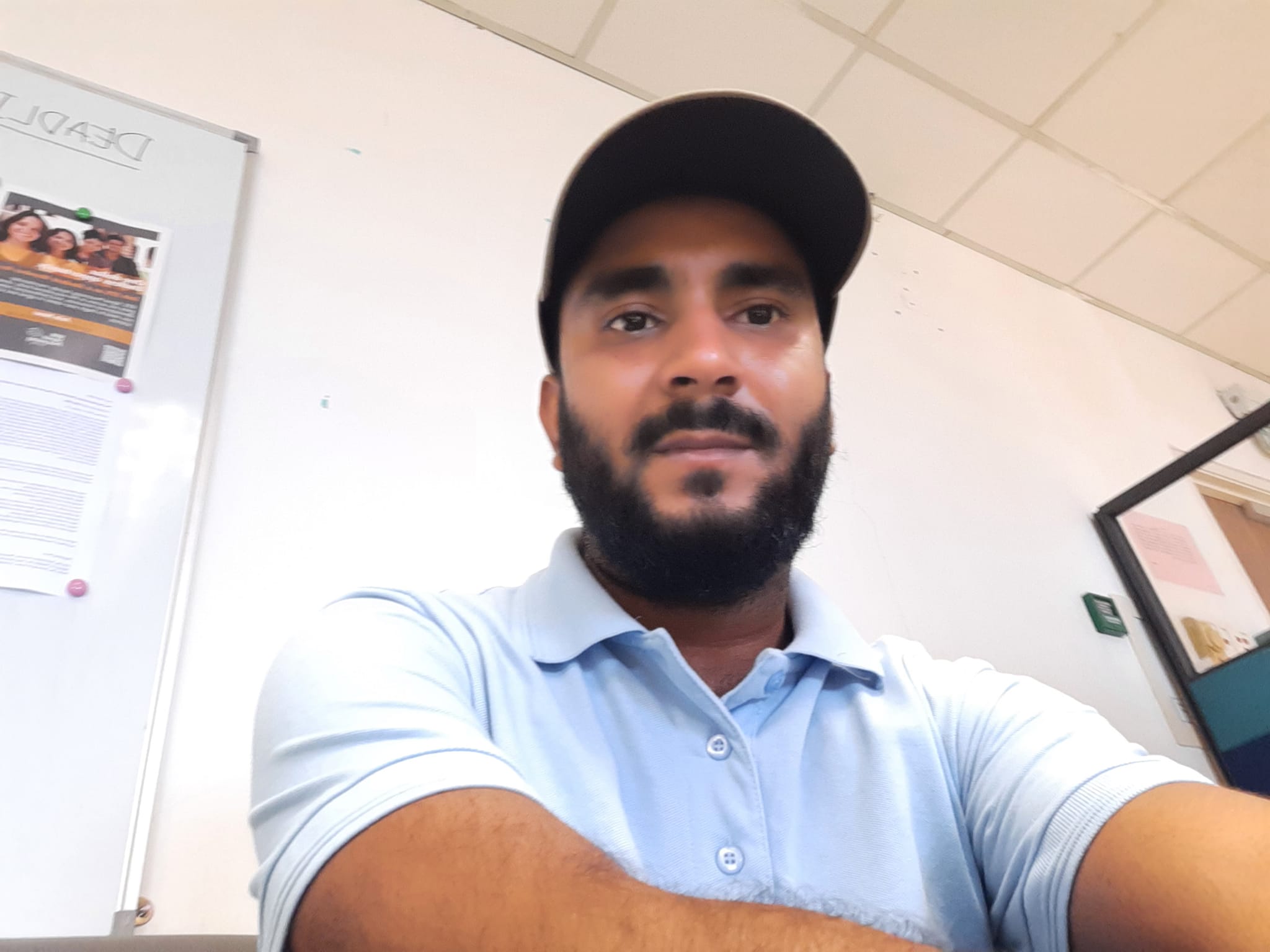 Mohammed Forekan working at his research office desk